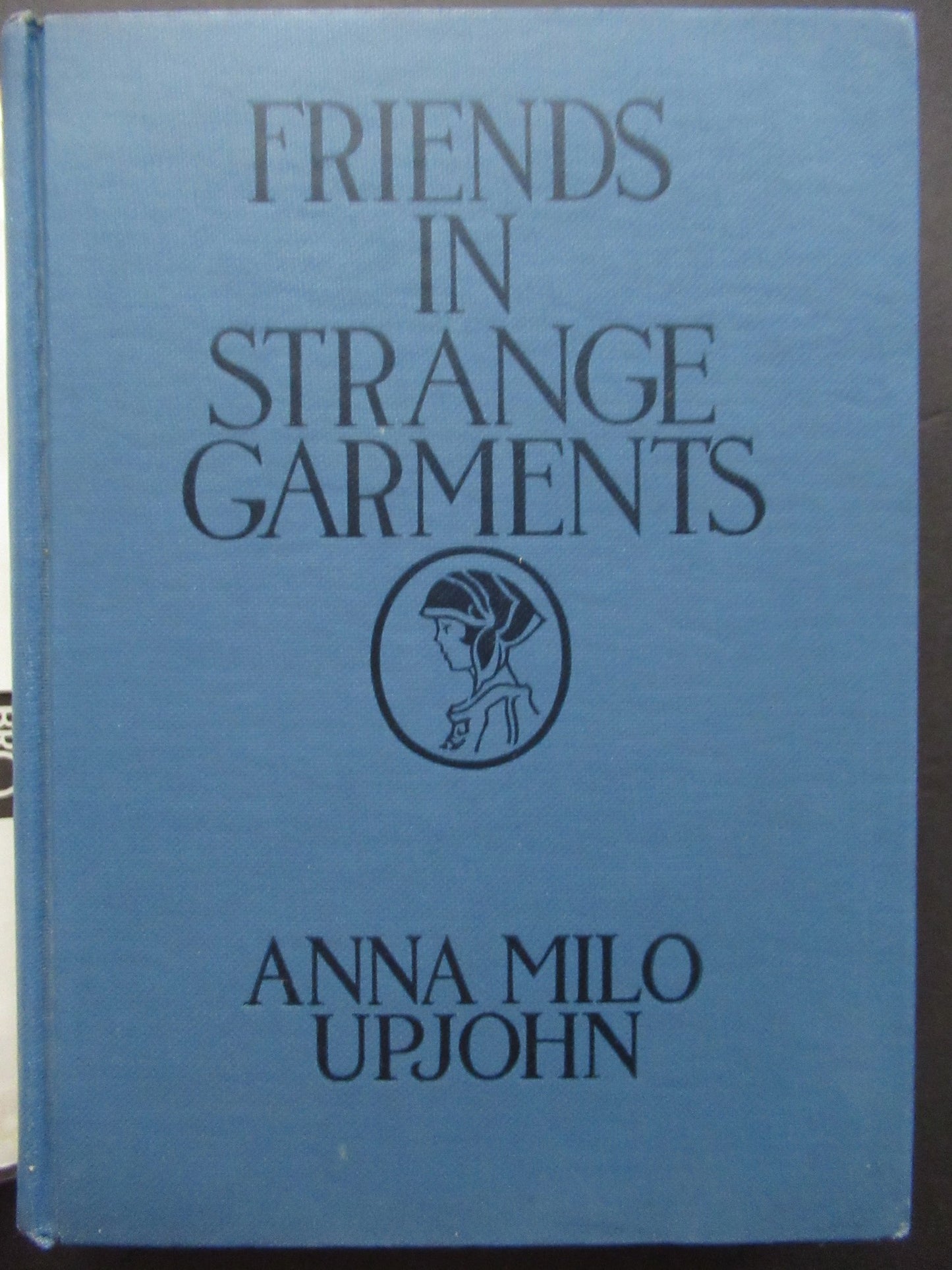 Friends in Strange Garments