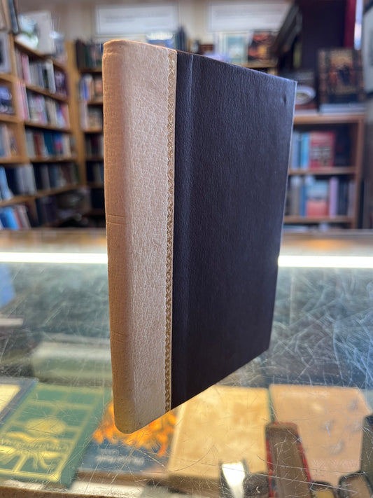 Brown and Cream Colored Tiny Notebook